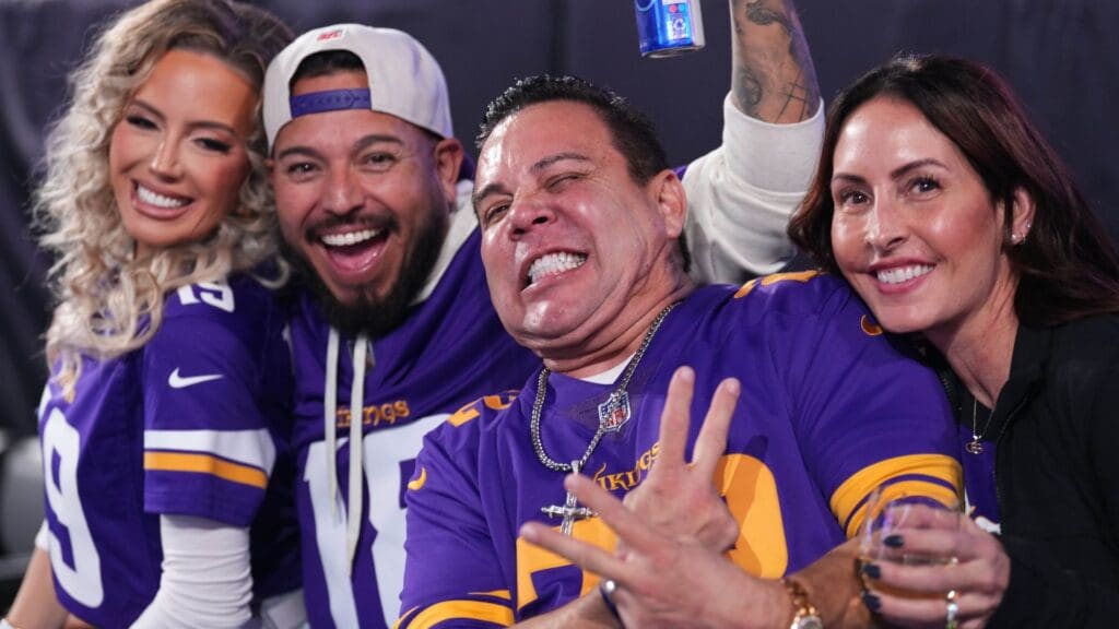 Jan 13, 2025; Glendale, AZ, USA; Minnesota Vikings fans react during the first half against the Los Angeles Rams in an NFC wild card game at State Farm Stadium.