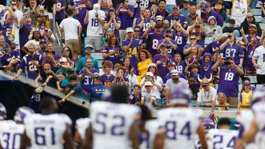 Nov 10, 2024; Jacksonville, Florida, USA; Minnesota Vikings fans cheer on the team as they enter the tunnel before the game against the Jacksonville Jaguars at EverBank Stadium.
