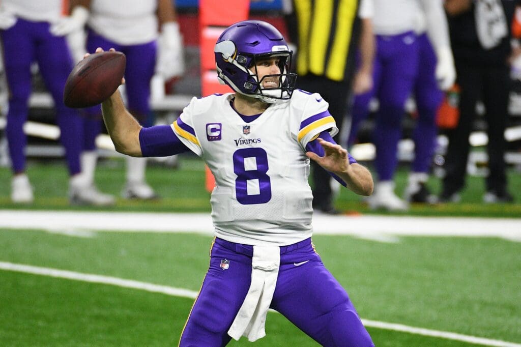 Jan 3, 2021; Detroit, Michigan, USA; Minnesota Vikings quarterback Kirk Cousins (8) throws a pass against the Detroit Lions during the first quarter at Ford Field