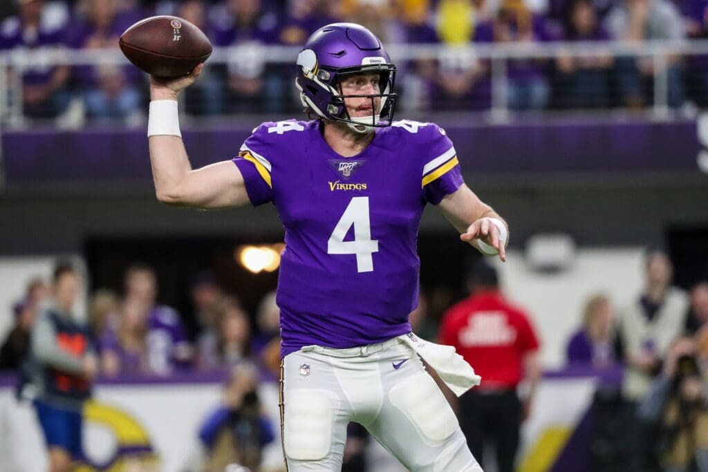 Dec 29, 2019; Minneapolis, Minnesota, USA; Minnesota Vikings quarterback Sean Mannion (4) throws during the first quarter against the Chicago Bears at U.S. Bank Stadium.