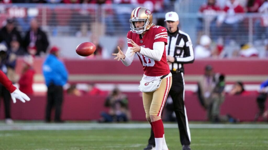 Jan 7, 2024; Santa Clara, California, USA; San Francisco 49ers punter Mitch Wishnowsky (18) catches a snap against the Los Angeles Rams during the fourth quarter at Levi's Stadium.