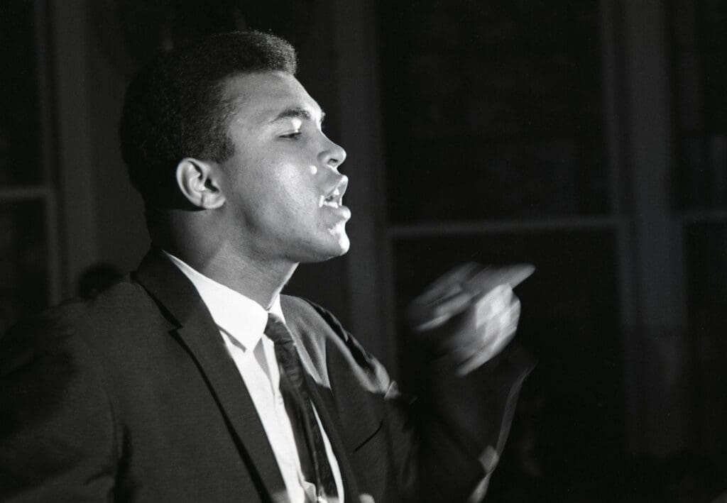 Mar 29, 1967; Louisville, KY, USA: FILE PHOTO; Muhammad Ali speaks to a group of open-housing supporters at Antioch Baptist Church in Louisville