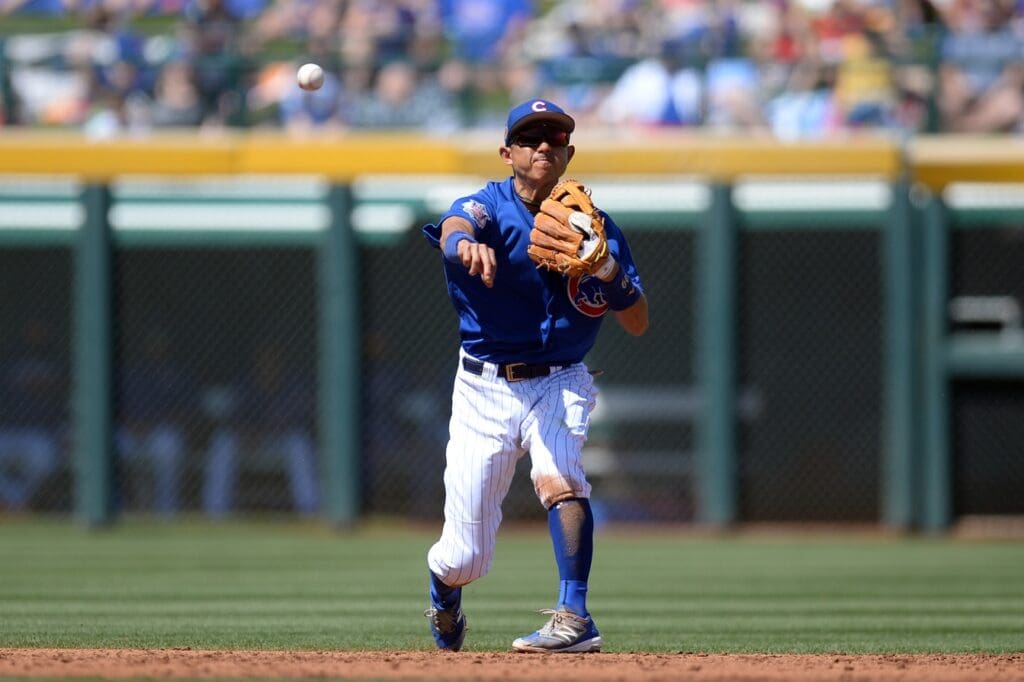 Mar 26, 2017; Mesa, AZ, USA; Chicago Cubs shortstop Munenori Kawasaki (66) throws to first base against the San Diego Padres during the second inning at Sloan Park.