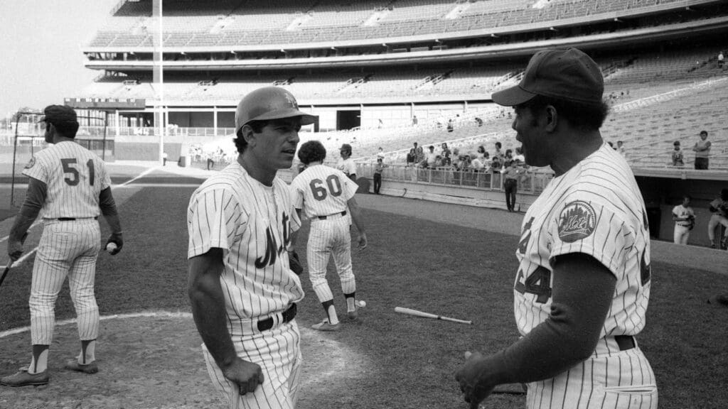 NY Mets infielder Bobby Valentine (left) talks with coach Willie Mays during a game against the Philadelphia Phillies in New York City on June 29, 1977.