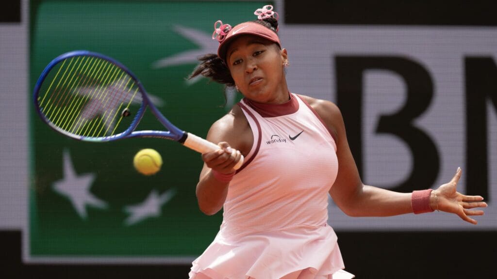 May 26, 2025; Paris, FR; Naomi Osaka of Japan returns a shot during her match against Paula Badosa of Spain on day two at Roland Garros Stadium.