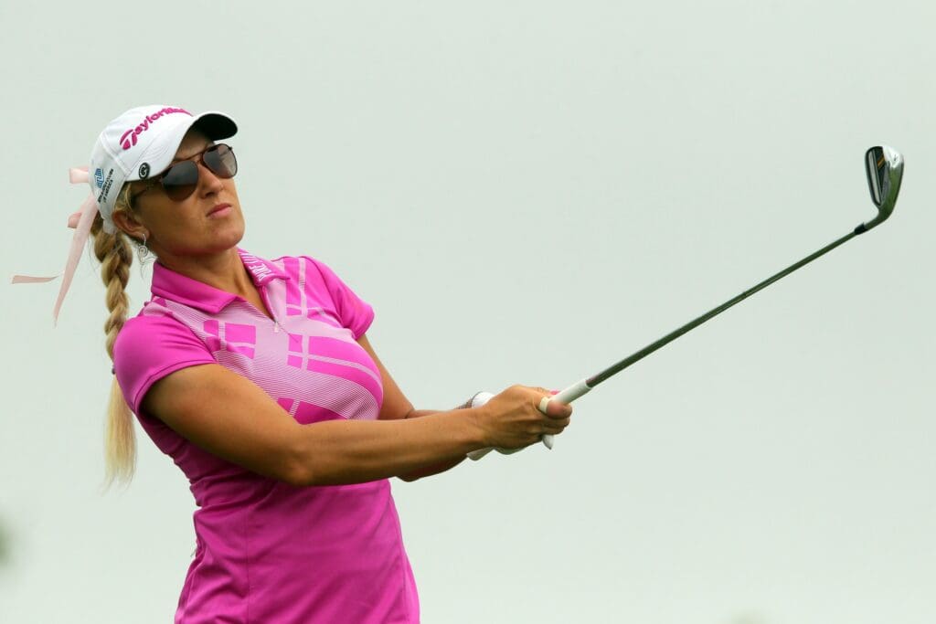 Jun 28, 2013; Southampton, NY, USA; Natalie Gulbis (USA) tees off on the twelfth hole during the second round of the U.S. Women's Open at Sebonack Golf Course.