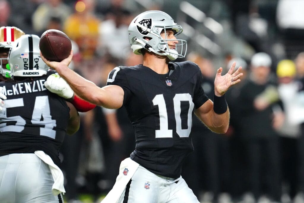 Aug 23, 2024; Paradise, Nevada, USA; Las Vegas Raiders quarterback Nathan Peterman (10) makes a pass attempt against the San Francisco 49ers during the second quarter at Allegiant Stadium.