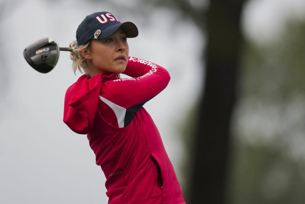 Sep 13, 2024; Gainesville, Virginia, USA; Nelly Korda of Team USA lines plays a shot from the second tee during Foursomes matches against Team Europe during the first round of the Solheim Cup 2024 at Robert Trent Jones Golf Club.