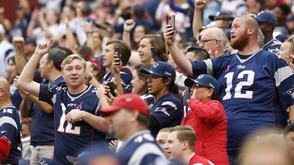 Oct 6, 2019; Landover, MD, USA; New England Patriots fans cheer in the stands against the Washington Redskins in the third quarter at FedExField.