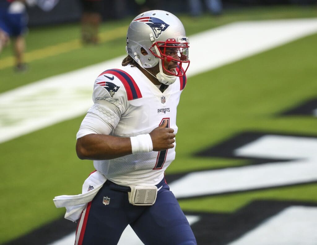 Nov 22, 2020; Houston, Texas, USA; New England Patriots quarterback Cam Newton (1) reacts after the Patriots score a touchdown during the first quarter against the Houston Texans at NRG Stadium