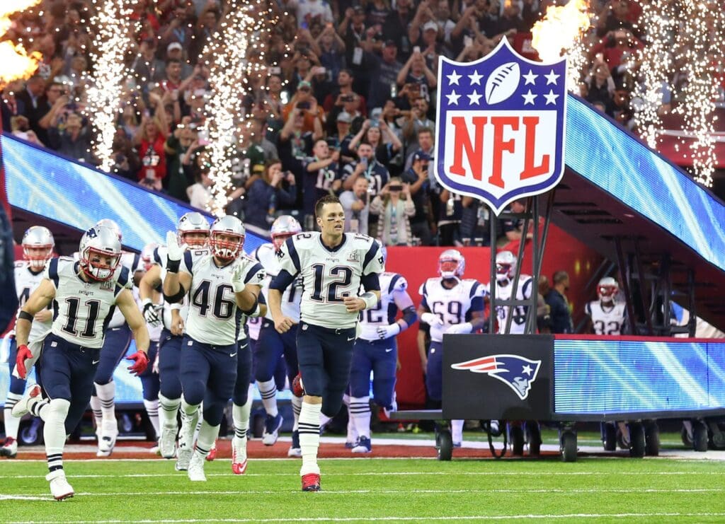 Feb 5, 2017; Houston, TX, USA; New England Patriots quarterback Tom Brady (12) leads his team onto the field prior to the game against the Atlanta Falcons during Super Bowl LI at NRG Stadium
