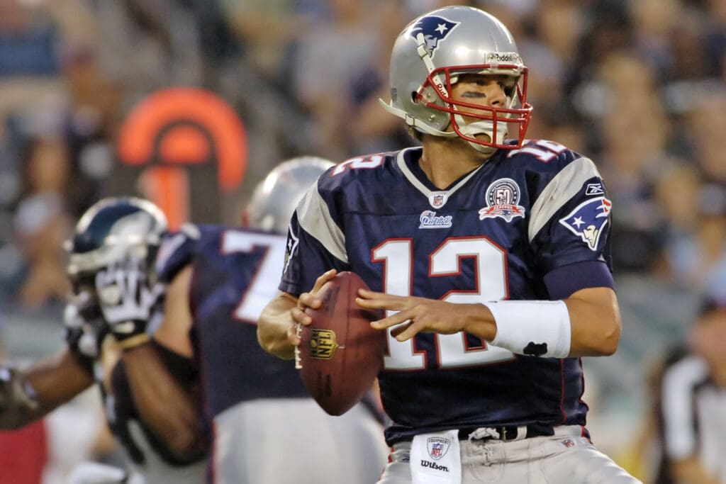August 13, 2009; Philadelphia, PA USA; New England Patriots quarterback Tom Brady (12) gets ready to throw during pre-season game against the Philadelphia Eagles at Lincoln Financial Field.