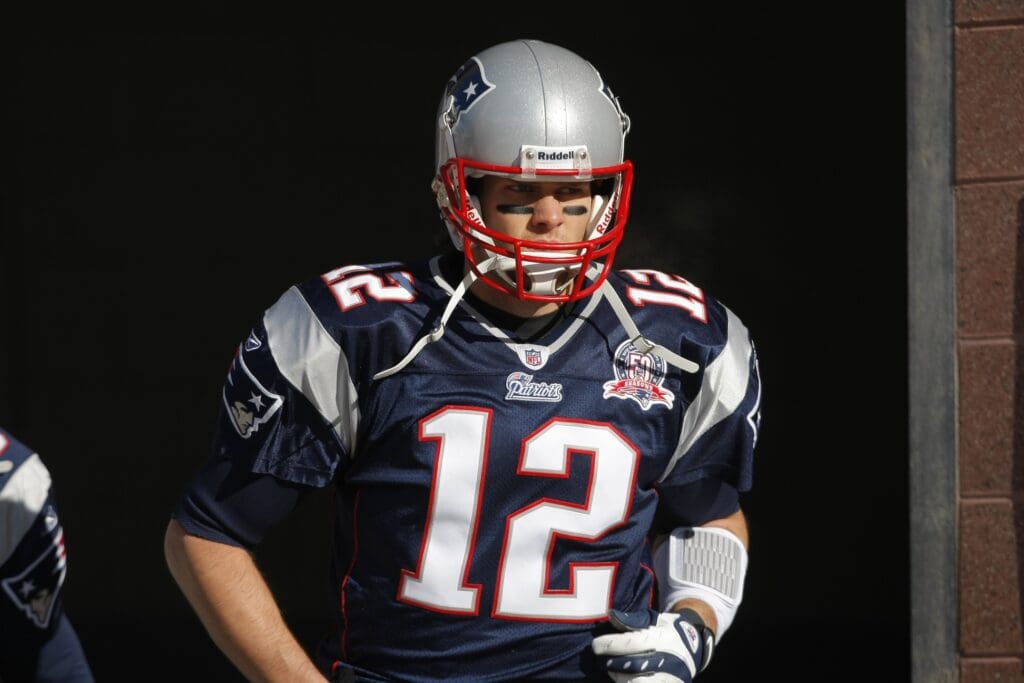 Jan 10, 2010; Foxboro, MA, USA; New England Patriots quarterback Tom Brady (12) warms up before the start of the 2010 AFC wild card playoff game against the Baltimore Ravens at Gillette Stadium.