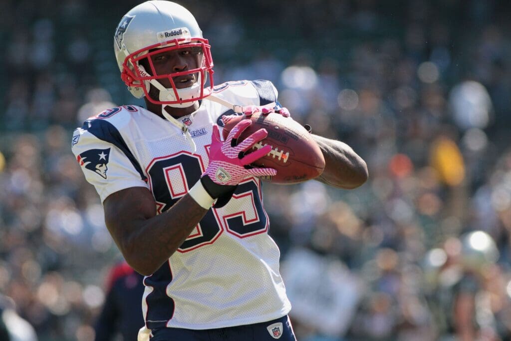 Oct 2, 2011; Oakland, CA, USA; New England Patriots wide receiver Chad Ochocinco (85) catches the ball during warmups before the start of the game against the Oakland Raiders at O.co Coliseum.