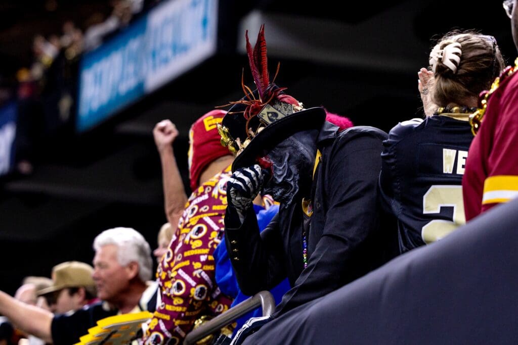 Dec 15, 2024; New Orleans, Louisiana, USA; New Orleans Saints fan reacts to a failed attempt on a two point conversion against the Washington Commanders as time expires at Caesars Superdome.