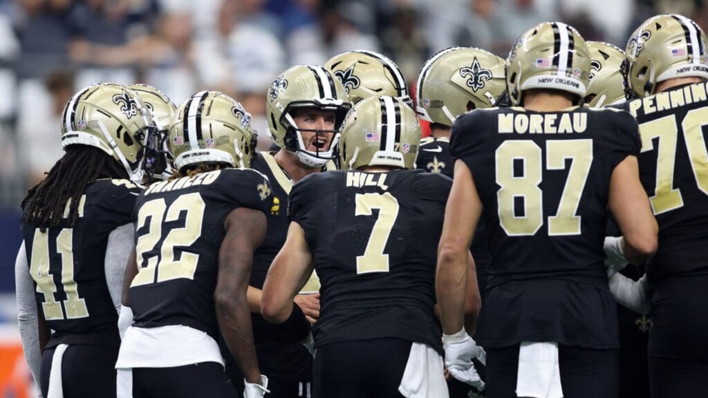 Sep 15, 2024; Arlington, Texas, USA; New Orleans Saints quarterback Derek Carr (4) calls a play against the Dallas Cowboys in the second quarter at AT&T Stadium