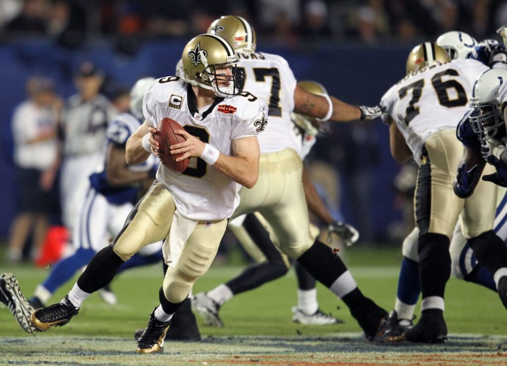 Feb 7, 2010; Miami, FL, USA; New Orleans Saints quarterback Drew Brees (9) in the pocket during the third quarter of Super Bowl XLIV against the Indianapolis Colts at Sun Life Stadium.
