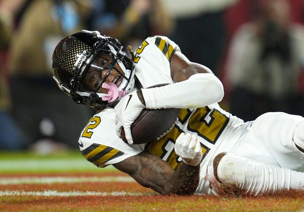 Oct 7, 2024; Kansas City, Missouri, USA; New Orleans Saints wide receiver Rashid Shaheed (22) catches a touchdown pass during the first half against the Kansas City Chiefs at GEHA Field at Arrowhead Stadium.