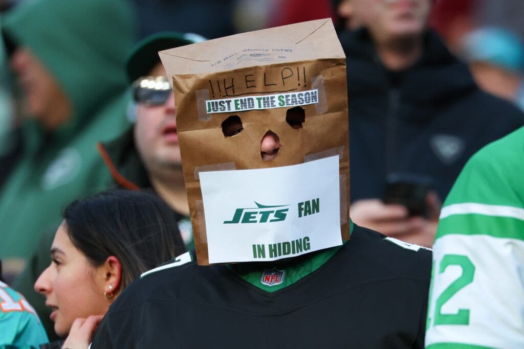 Jan 5, 2025; East Rutherford, New Jersey, USA; A New York Jets fan looks on during the first quarter of the game between the New York Jets and the Miami Dolphins at MetLife Stadium.