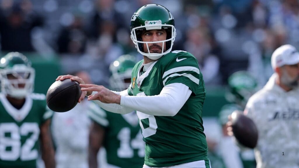 Nov 17, 2024; East Rutherford, New Jersey, USA; New York Jets quarterback Aaron Rodgers (8) warms up before a game against the Indianapolis Colts at MetLife Stadium.