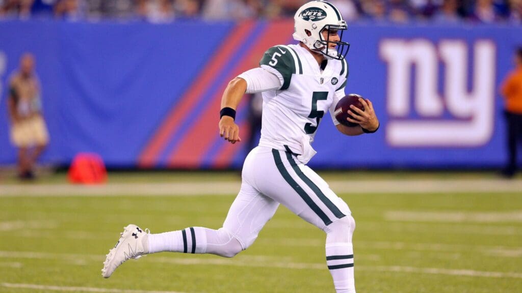 Aug 26, 2017; East Rutherford, NJ, USA; New York Jets quarterback Christian Hackenberg (5) runs with the ball against the New York Giants during the second quarter of a preseason game at MetLife Stadium.