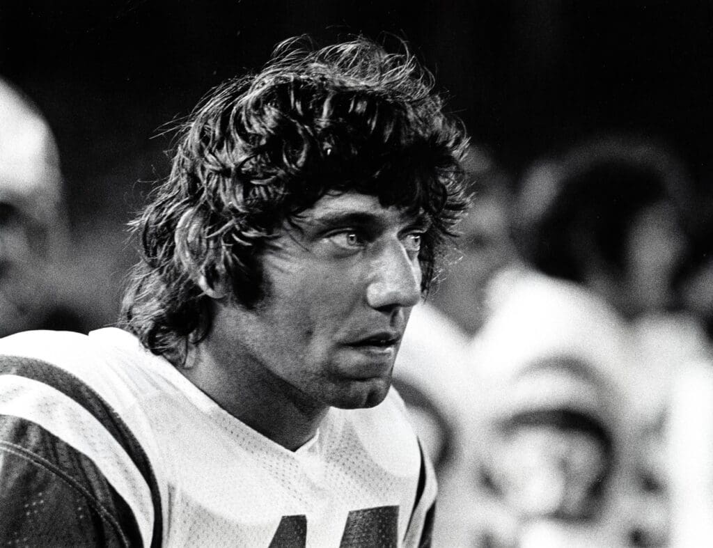 Aug 23, 1974; St. Louis, MO, USA; FILE PHOTO; New York Jets quarterback Joe Namath watches on the sideline during a pre-season game against the St. Louis Cardinals at Busch Stadium.