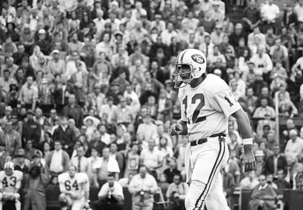 Oct 5, 1969; Boston, MA, USA: FILE PHOTO; New York Jets quarterback Joe Namath (12) against the Boston Patriots at Boston College Stadium.