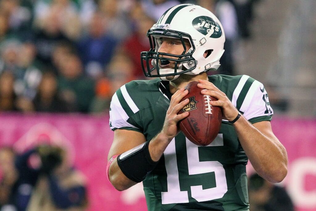Oct 8, 2012; East Rutherford, NJ, USA; New York Jets quarterback Tim Tebow (15) looks to pass during the first half of their game against the Houston Texans at MetLIfe Stadium