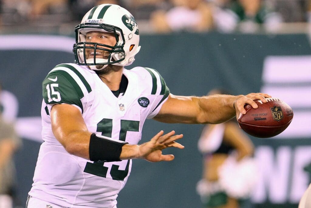 Aug 26, 2012; East Rutherford, NJ, USA; New York Jets quarterback Tim Tebow (15) throws a pass during the second half of their game against the Carolina Panthers at MetLife Stadium. The Panthers defeated the Jets 17-12.