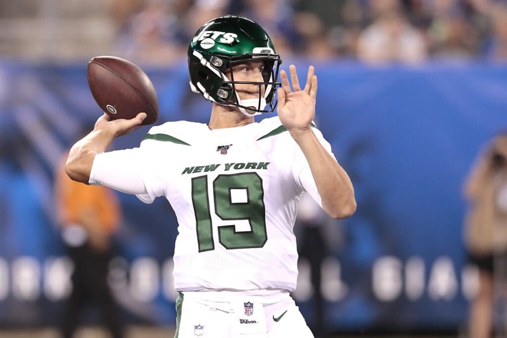 Aug 8, 2019; East Rutherford, NJ, USA; New York Jets quarterback Trevor Siemian (19) drops back for a pass against the New York Giants during the first half at MetLife Stadium.