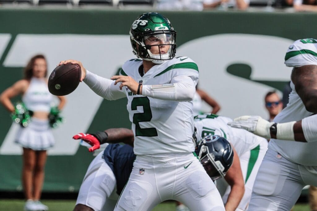 Oct 3, 2021; East Rutherford, New Jersey, USA; New York Jets quarterback Zach Wilson (2) throws the ball against the Tennessee Titans during the first half at MetLife Stadium.
