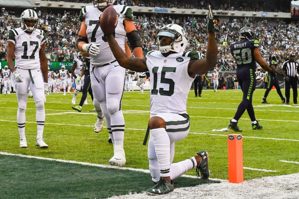 Oct 2, 2016; East Rutherford, NJ, USA; New York Jets wide receiver Brandon Marshall (15) celebrates a second quarter touchdown against the Seattle Seahawks at MetLife Stadium.