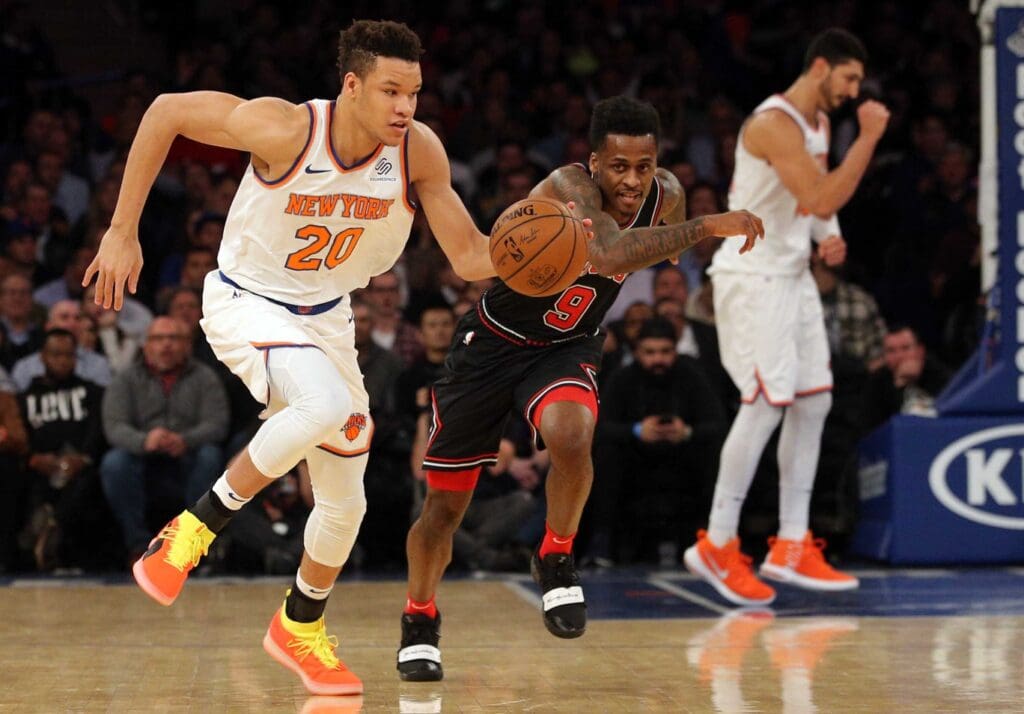 Nov 5, 2018; New York, NY, USA; New York Knicks small forward Kevin Knox (20) drives with the ball after stealing it from Chicago Bulls shooting guard Antonio Blakeney (9) during the second quarter at Madison Square Garden.