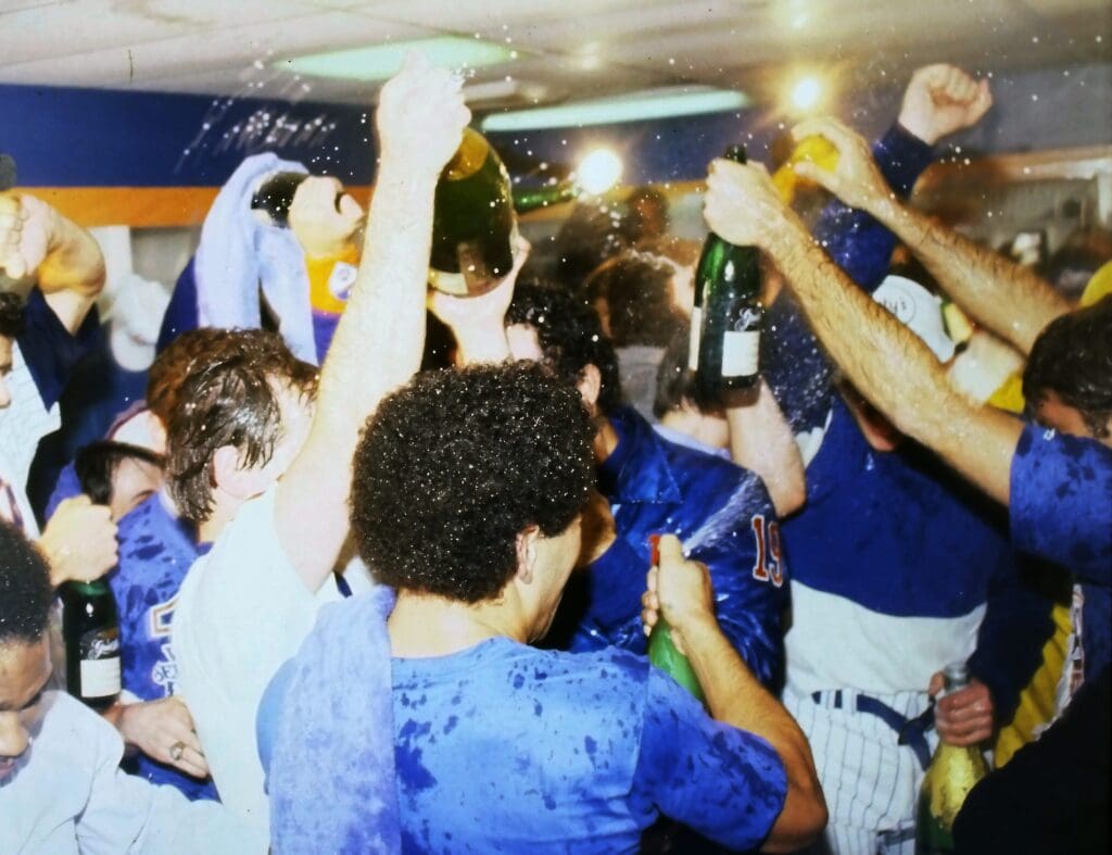 New York Mets celebrate in their clubhouse on the field after defeating the Boston Red Sox in game 7 of the 1986 World Series at Shea Stadium Oct. 27, 1986