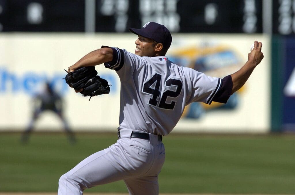 Apr 15, 2007; Oakland, CA, USA; New York Yankees closing pitcher Mariano Rivera (42) pitches against the Oakland Athletics during the 9th inning at McAfee Coliseum in Oakland, CA. In honor of Jackie Robinson on the 60th Anniversary of Robinson breaking the color barrier in professional baseball, players were allowed to wear number 42. Rivera is currently the only active player to wear number 42.