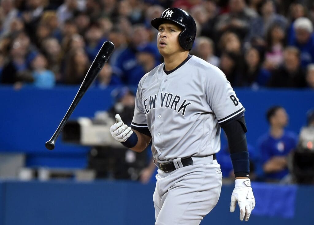 Apr 13, 2016; Toronto, Ontario, CAN; New York Yankees designated hitter Alex Rodriguez (13) flips his bat as he strikes out against Toronto Blue Jays in the fourth inning at Rogers Centre.