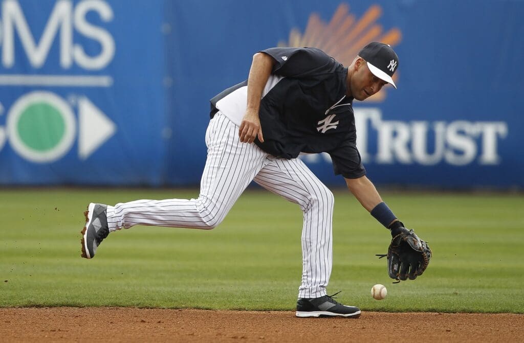 Feb 27, 2014; Tampa, FL, USA; New York Yankees shortstop Derek Jeter (2) works out prior to the game against the Pittsburgh Pirates at George M. Steinbrenner Field.
