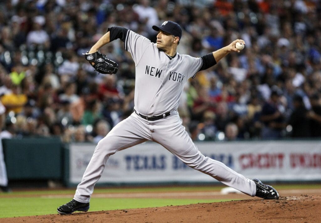 Sep 28, 2013; Houston, TX, USA; New York Yankees starting pitcher Andy Pettitte (46) pitches during the first inning against the Houston Astros at Minute Maid Park.