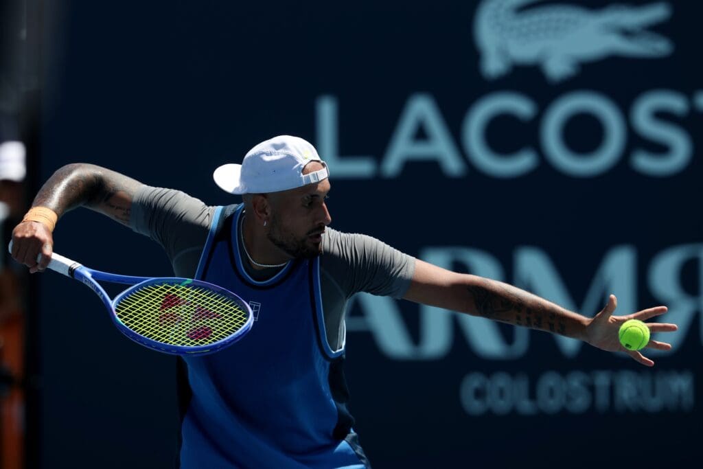 Mar 21, 2025; Miami, FL, USA; Nick Kyrgios (AUS) hits a ball out of the stadium in frustration after losing a point against Karen Khachanov (not pictured) on day four of the Miami Open at Hard Rock Stadium.