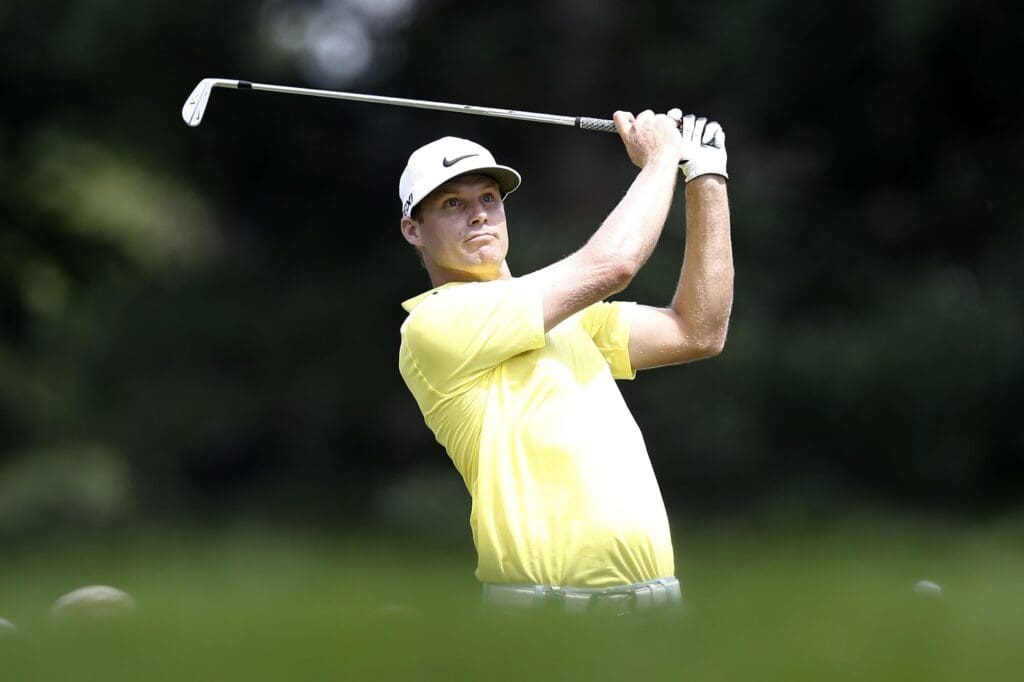 Nick Watney tees off on the 16th hole during the first round of the 95th PGA Championship at Oak Hill Country Club.