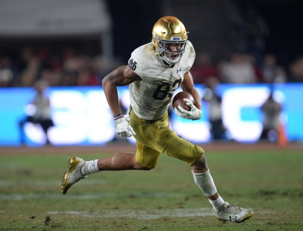 November 24, 2018; Los Angeles, CA, USA; Notre Dame Fighting Irish wide receiver Chase Claypool (83) runs the ball against the Southern California Trojans during the second half at the Los Angeles Memorial Coliseum.