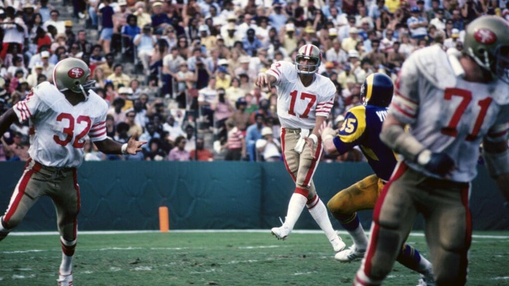 Oct 8, 1978; Los Angeles, CA, USA; FILE PHOTO; San Francisco 49ers quarterback Steve DeBerg (17) throws a pass to O.J. Simpson (32) over Los Angeles Rams defensive end Jack Youngblood (85) at the Coliseum. The Rams defeated the 49ers 27-10