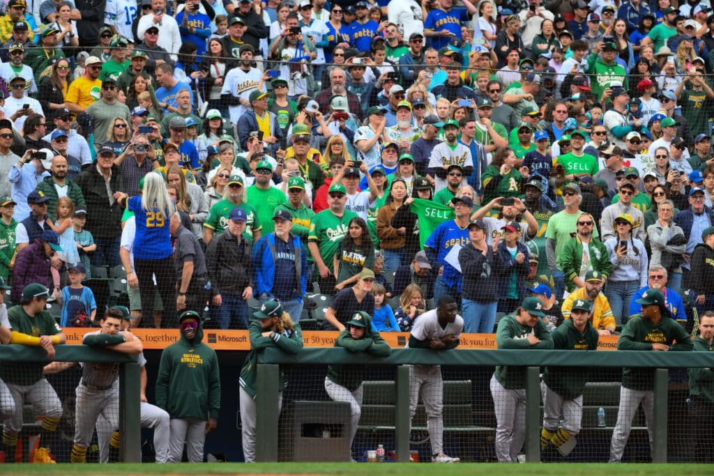 Sep 29, 2024; Seattle, Washington, USA; Oakland Athletics fans stand up during the final out of the ninth inning against the Seattle Mariners at T-Mobile Park.