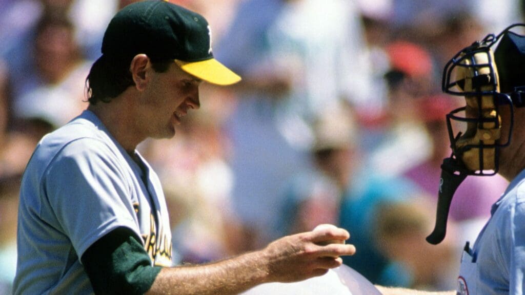 Unknown Date, 1989; Unknown Location, USA; FILE PHOTO; Oakland Athletics pitcher Bob Welch and umpire hold a large balloon on the field.