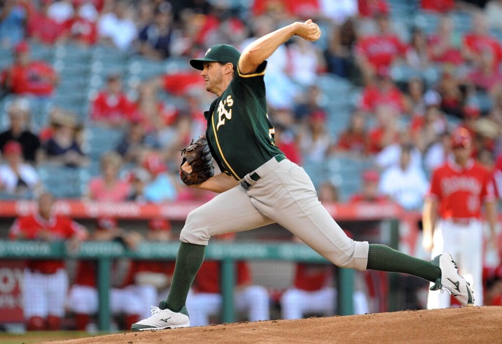 September 30, 2015; Anaheim, CA, USA; Oakland Athletics starting pitcher Barry Zito (75) pitches the first inning against the Los Angeles Angels at Angel Stadium of Anaheim.