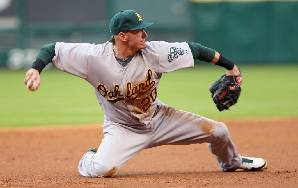 Apr 6, 2013; Houston, TX, USA; Oakland Athletics third baseman Josh Donaldson (20) throws to first base during the third inning against the Houston Astros at Minute Maid Park.