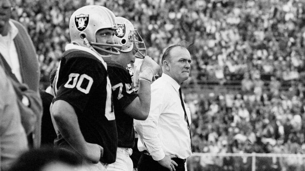 Jan 14, 1968; Miami, FL, USA; FILE PHOTO; Oakland Raiders head coach John Rauch on the sidelines with center (00) Jim Otto in Super Bowl II against the Green Bay Packers at the Orange Bowl. The Packers defeated the Raiders 33-14 to win their 2nd consecutive Super Bowl title