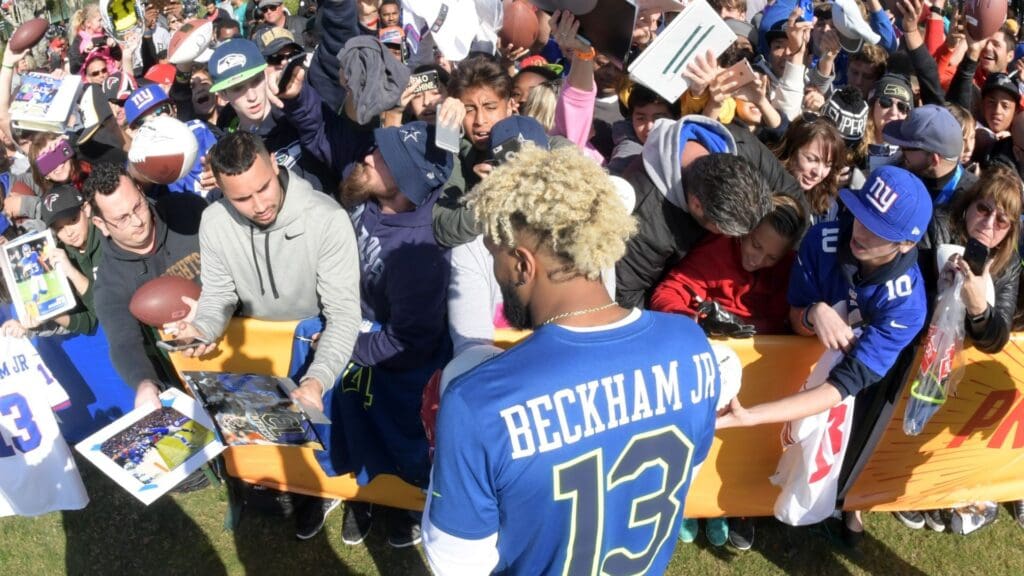 Jan 27, 2017; Kissimmee, FL, USA; NFC receiver Odell Beckham Jr. of the New York Giants (13) signs autographs for fans during practice for the 2017 Pro Bowl at ESPN Wide World of Sports Complex.
