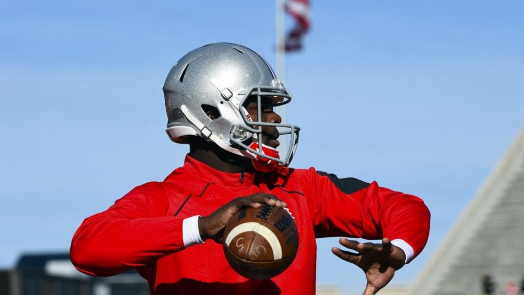 Nov 14, 2015; Champaign, IL, USA; Ohio State Buckeyes quarterback Cardale Jones (12) practices before the game against the Illinois Fighting Illini at Memorial Stadium.