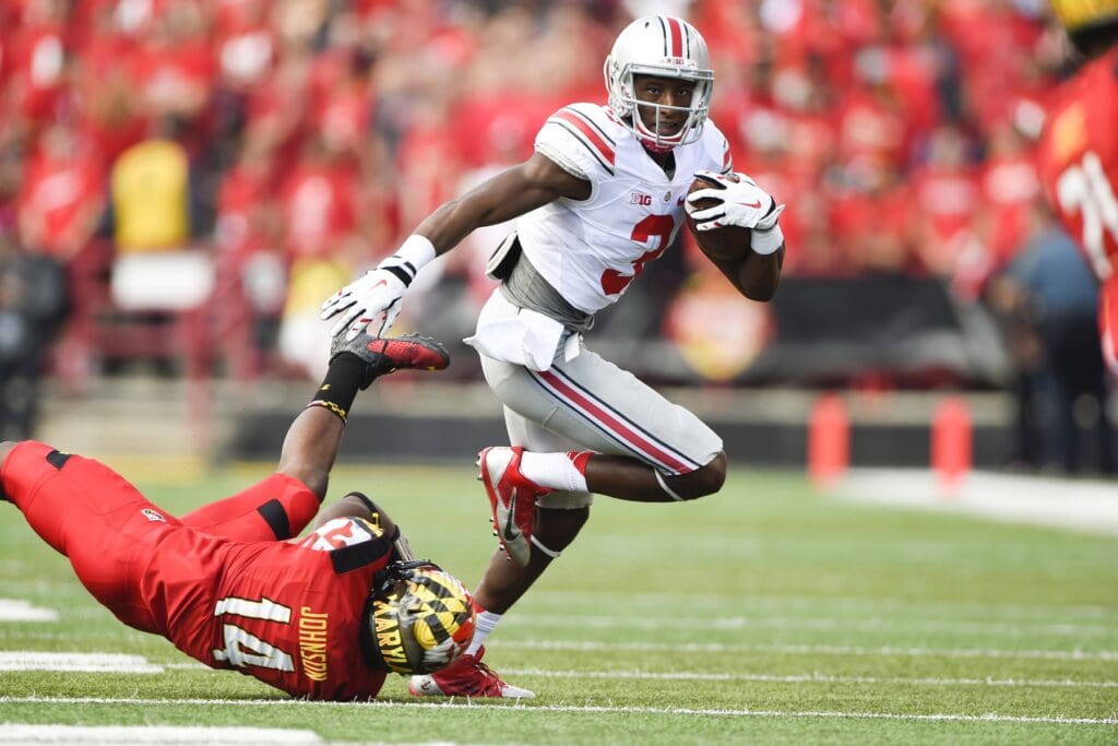 Oct 4, 2014; College Park, MD, USA; Ohio State Buckeyes wide receiver Michael Thomas (3) runs with the ball past Maryland Terrapins defensive back Jeremiah Johnson (14) during the second quarter at Byrd Stadium.